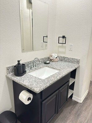 Hair dryer, towels, soap, toilet paper