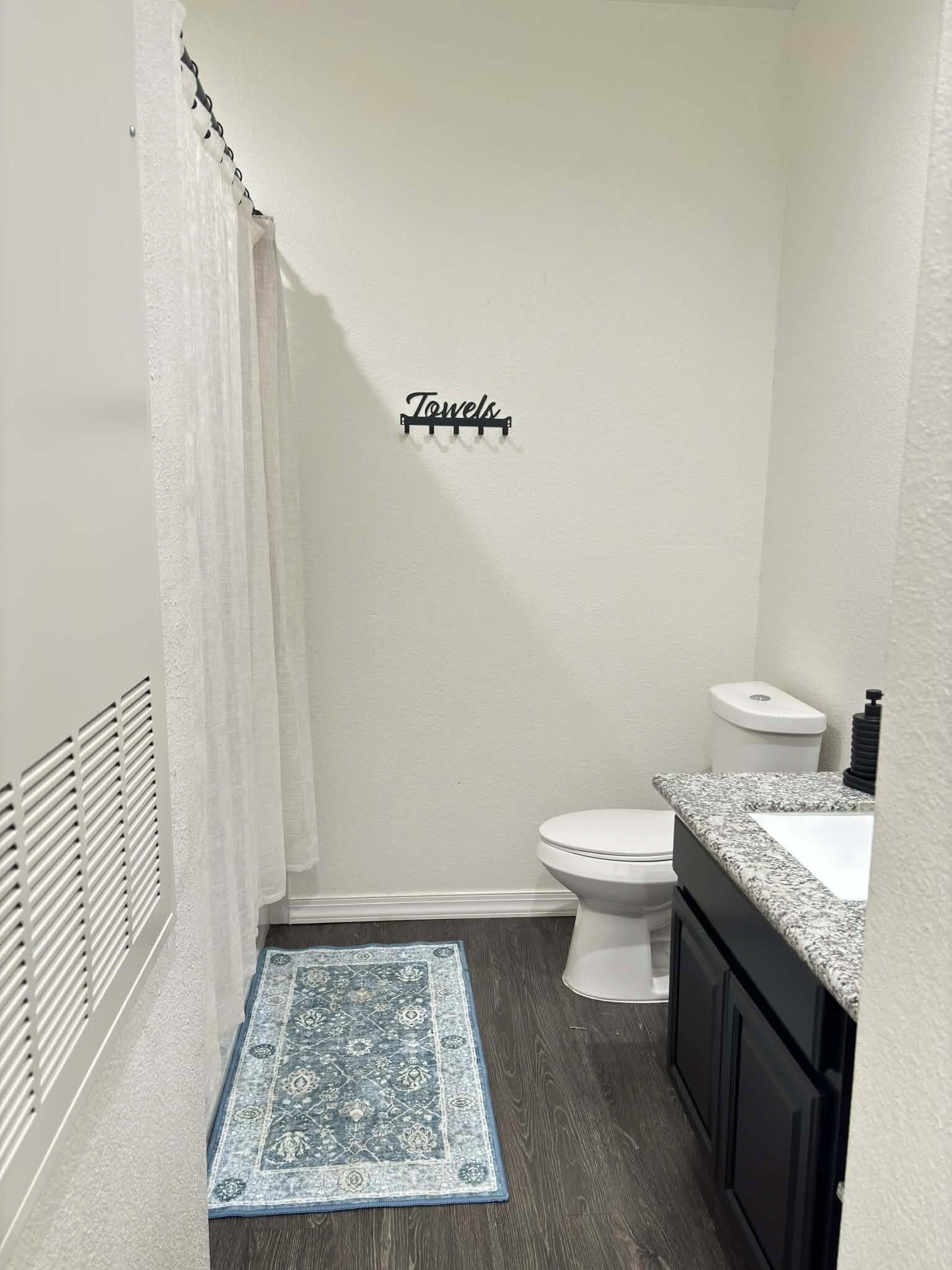 Hair dryer, towels, soap, toilet paper