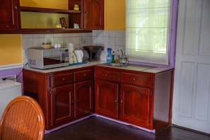 Microwave, stovetop, coffee/tea maker, electric kettle