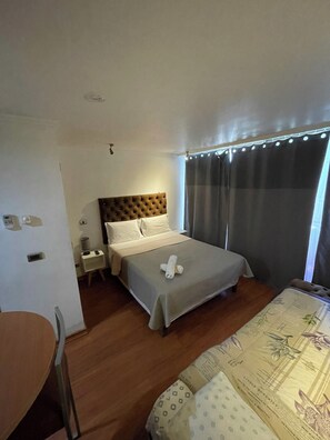 1 soverom, strykejern/-brett og sengetøy