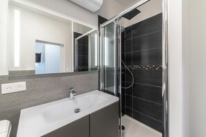 Hair dryer, towels, soap, toilet paper