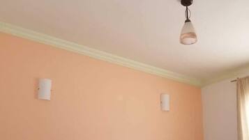 Habitación triple clásica, vista a la alberca | Wifi gratis