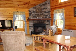 60-inch Smart TV with satellite channels, fireplace