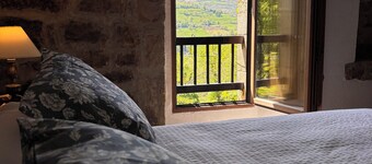 Lo Macario Pasiega cabin, with forest views