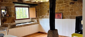 Lo Macario Pasiega cabin, with forest views