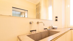 A bathroom with a sink, mirror, and window. - [130 sqm - Lima M1] Elegant & Luxury Design Flat (Milano)