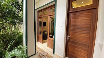 Superior Suite, Patio, Pool View | 1 bedroom, in-room safe, iron/ironing board, free WiFi