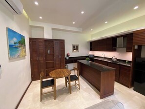 Superior Suite, Patio, Pool View | Living area