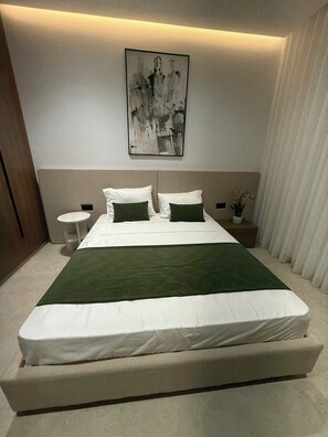 2 habitaciones, tabla de planchar con plancha, wifi y ropa de cama