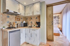 Enjoy a fully equipped kitchen with a dishwasher, microwave, toaster, and coffee maker.