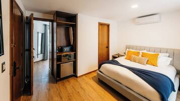 Comfort Room, Non Smoking, Balcony | In-room safe, desk, laptop workspace, iron/ironing board