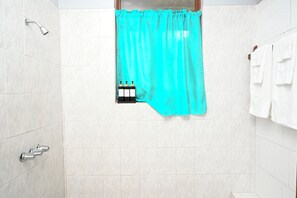 Shower, towels, soap, shampoo