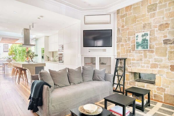 TV, fireplace, books, offices