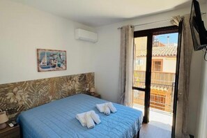 2 habitaciones, tabla de planchar con plancha, wifi y ropa de cama 