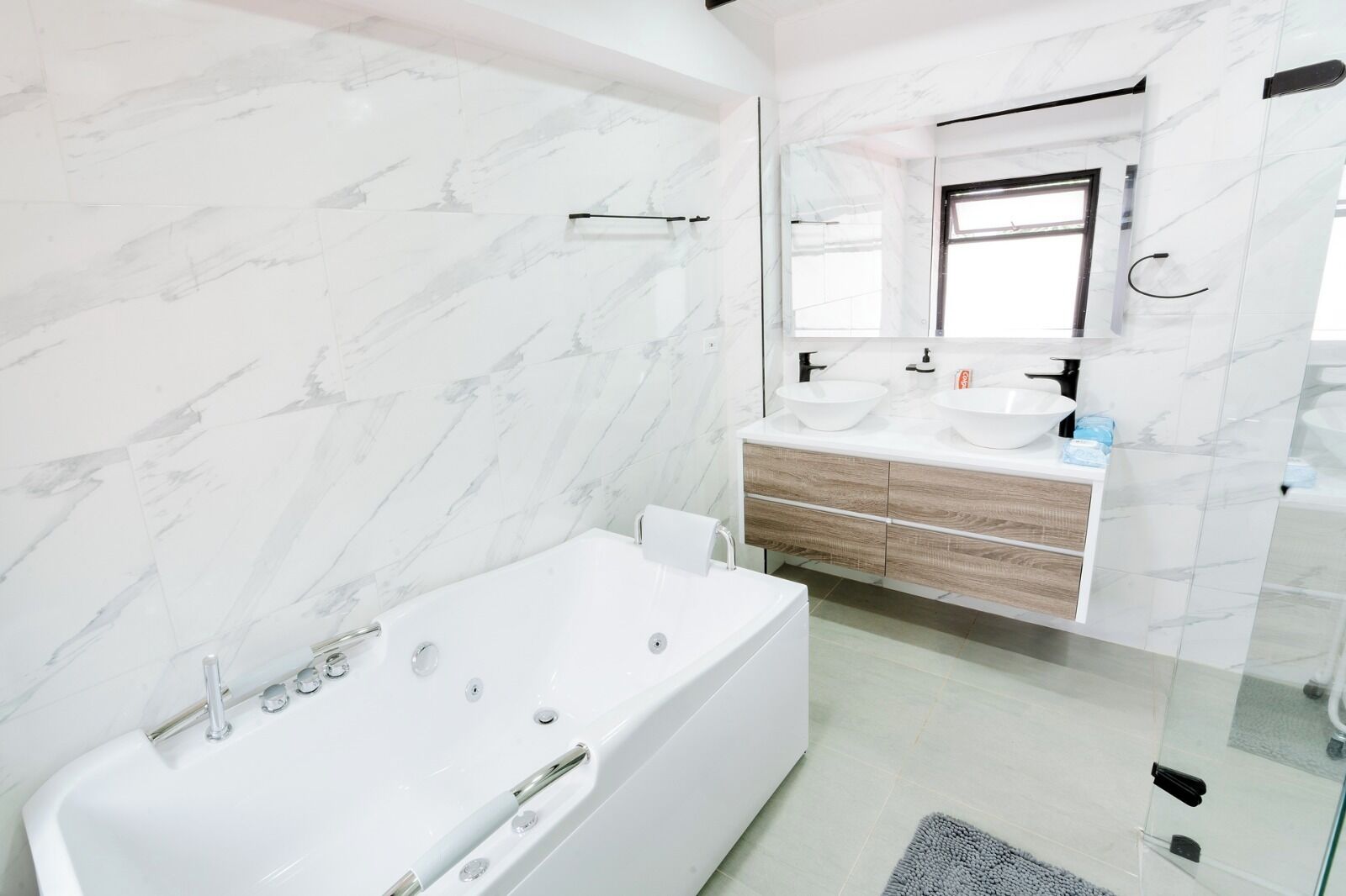 Shower, jetted tub, towels, soap
