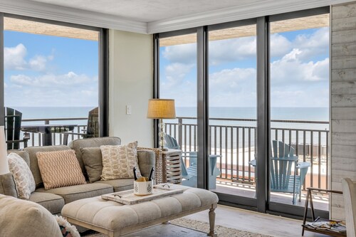 New dog-friendly Listing! Updated direct oceanfront 3/2 with spacious balcony and heated pool