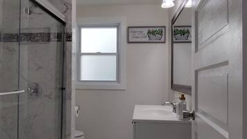 Hair dryer, towels, soap, toilet paper