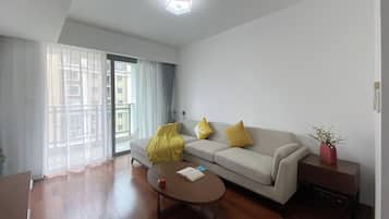 Condo, 2 Bedrooms, City View | Living area | 55-cm TV with digital channels