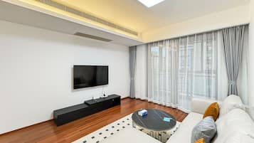 Condo, 2 Bedrooms, City View | Living area | 55-cm TV with digital channels