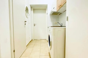 Shower, hair dryer, soap, shampoo