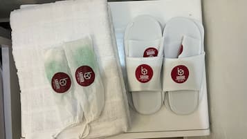 Shower, slippers, bidet, towels