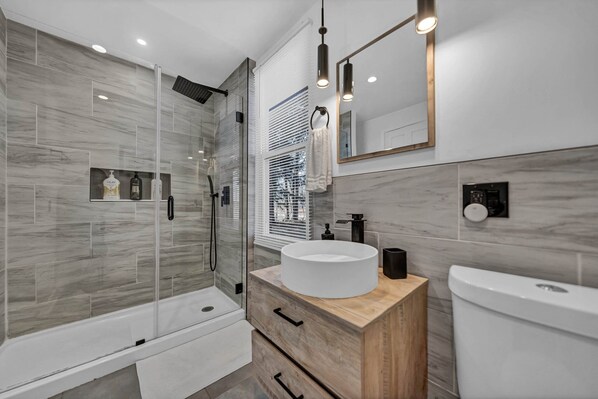 Shower, hair dryer, towels, soap