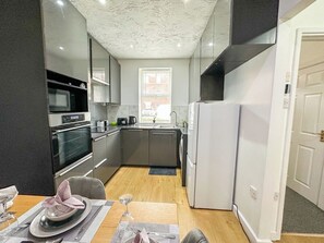 Fridge, microwave, oven, stovetop