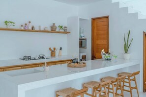 Fridge, microwave, cookware/dishes/utensils