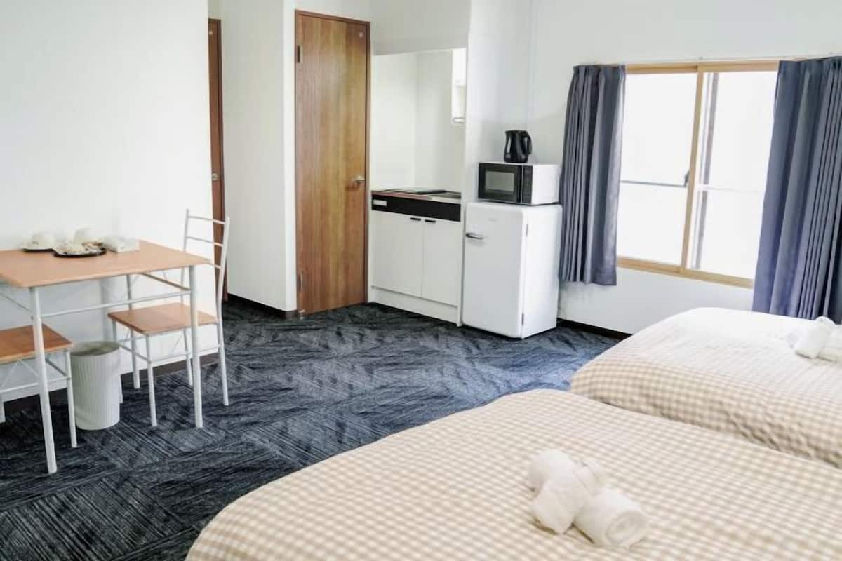Blackout curtains, rollaway beds, free WiFi, bed sheets
