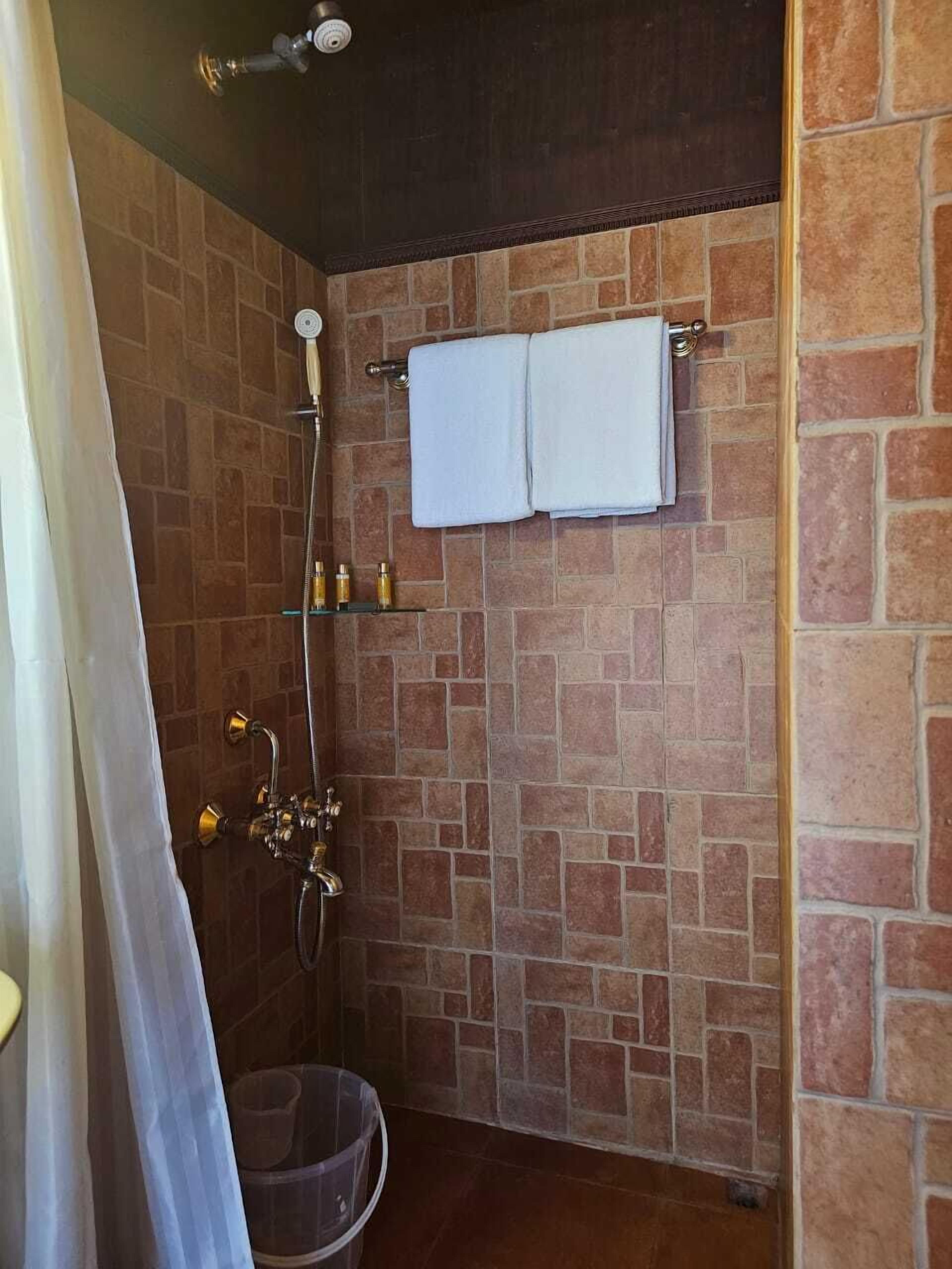 Shower, hair dryer, bathrobes, slippers