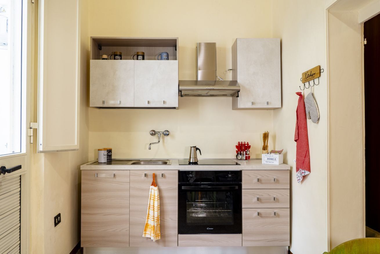 Frigorifero, forno, piano cottura, tostapane