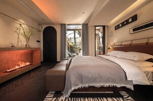 Premium bedding, down duvets, Select Comfort beds, in-room safe