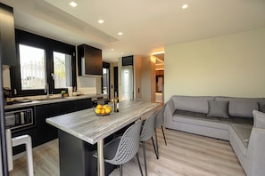 Family Apartment, Multiple Bedrooms (Kourouta Luxury Suites with Pool nr3) | Dining room - Grand Kourouta Pool Apartments (Ilida)