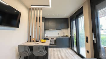 Family Apartment, Multiple Bedrooms (Kourouta Luxury Suites with Pool nr2) | Private kitchen | Fridge, microwave, oven, stovetop