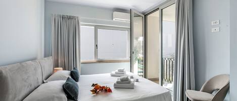 Familie huis, meerdere slaapkamers, 2 badkamers, aan het meer (Boutique apartment Giove with Pool) | 1 slaapkamer, gratis wifi, beddengoed