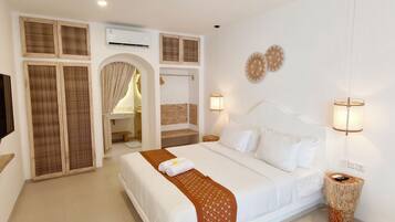 Family Villa, 2 Bedrooms, Patio, Pool View | 2 bedrooms, down duvets, memory-foam beds, desk