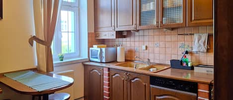 Family Quadruple Room | Cuisine privée