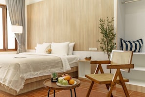 Habitación Deluxe doble | Decoración individual, mobiliario individual, cortinas opacas