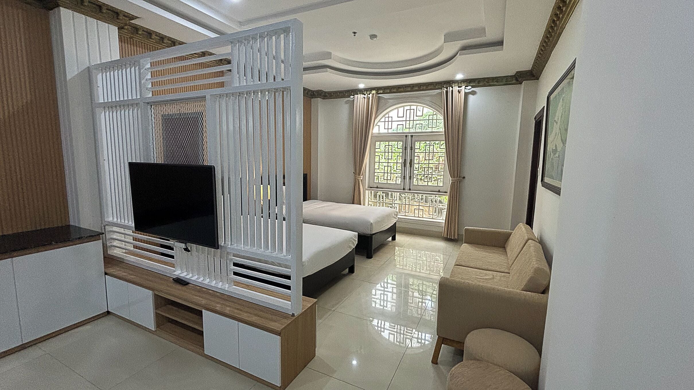 Family Apartment, City View | In-room safe, desk, laptop workspace, blackout drapes