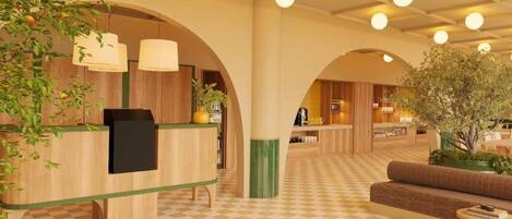 A hotel lobby with a check-in counter, seating area, and a large tree.