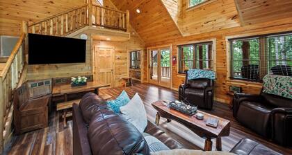 Stunning SML lakefront cabin: luxurious finishes, spacious rooms, wraparound deck, easy dock access. Family-friendly with toys, media room, serene views!