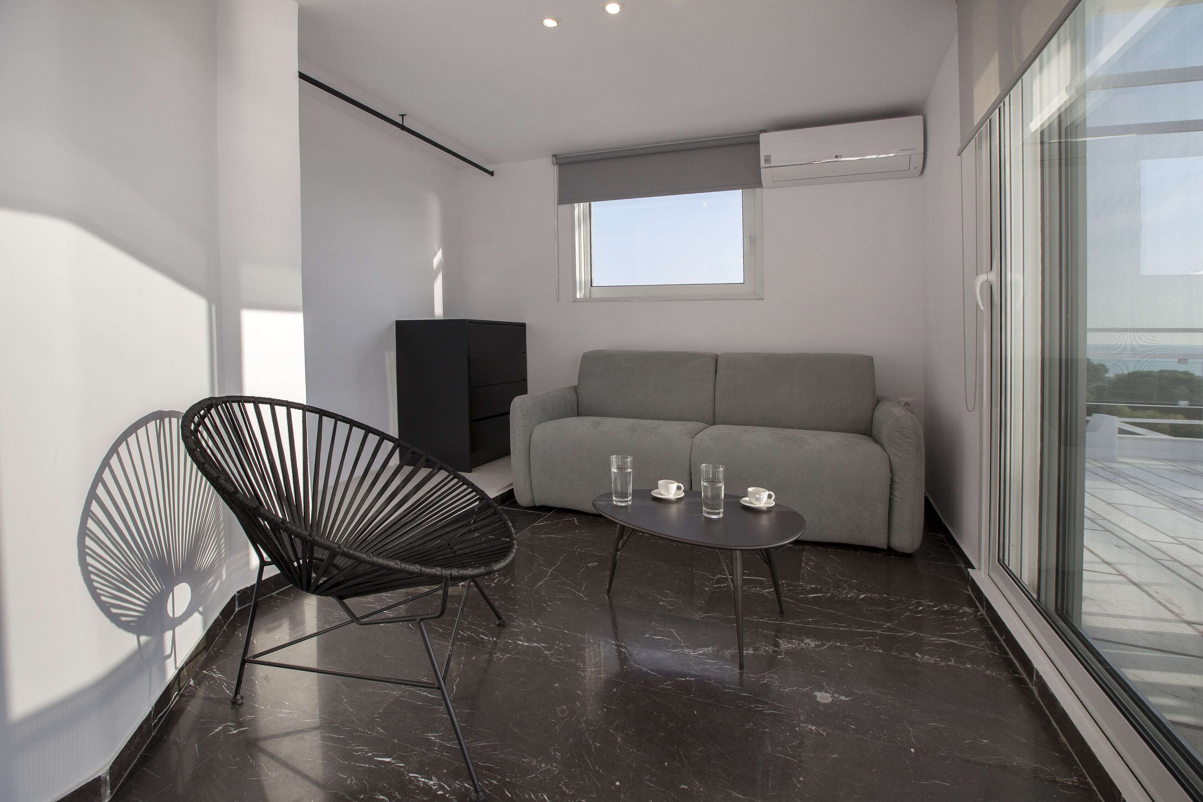 Comfort Apartment, 2 Bedrooms, Sea View | Living area | 24-inch TV with digital channels