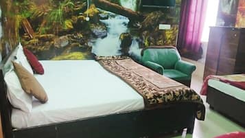 Desk, laptop workspace, bed sheets