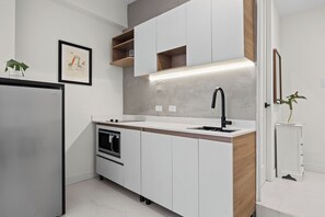 Fridge, microwave, coffee/tea maker, toaster