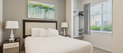 1 bedroom, desk, iron/ironing board, travel crib