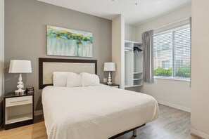 1 bedroom, desk, iron/ironing board, travel crib