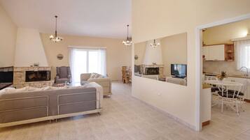 Family Villa, 4 Bedrooms, Private Pool | Living area | 40-inch TV with digital channels