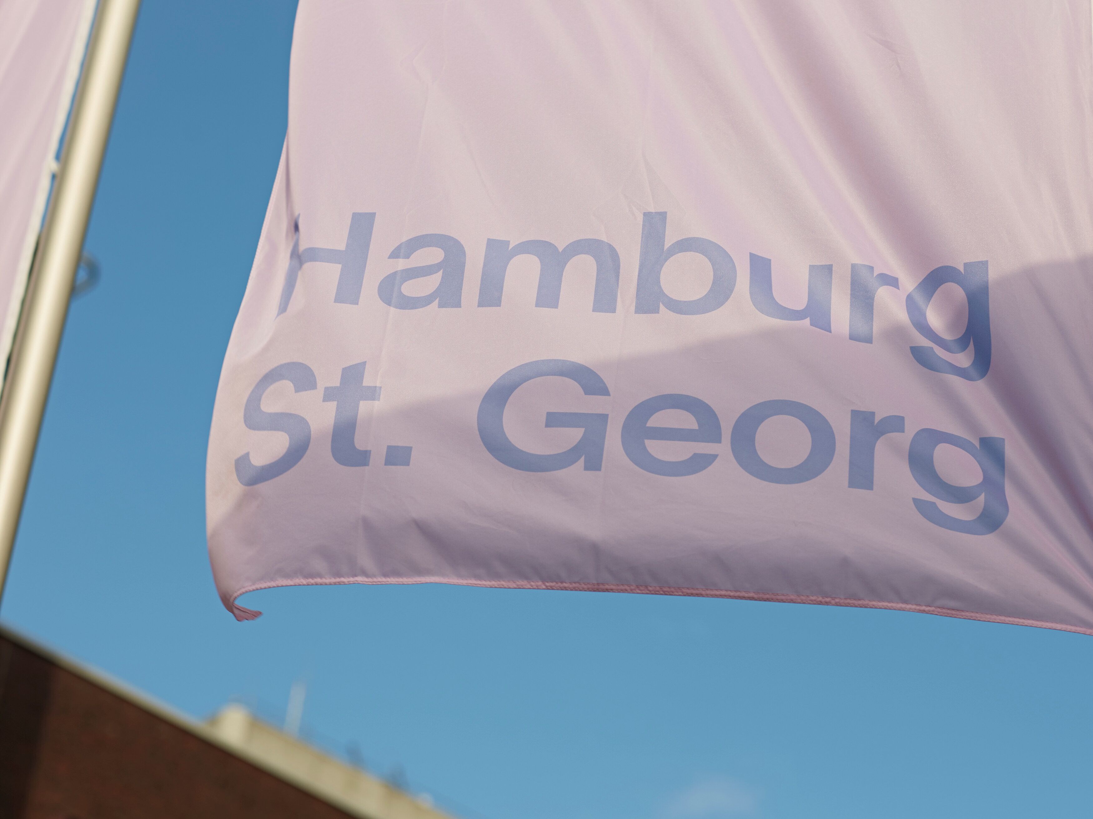 Uma bandeira com o texto 'Hamburg St. Georg'.
