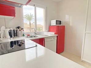 Fridge, microwave, dishwasher, coffee/tea maker