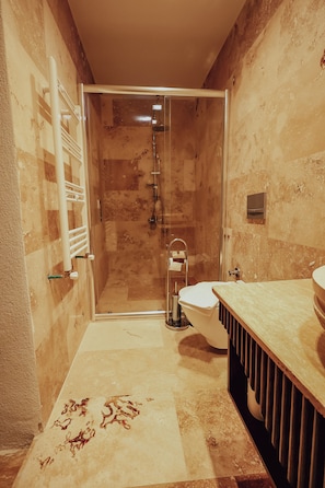 Superior Room, Courtyard View | Bathroom | Hair dryer, slippers, towels, soap